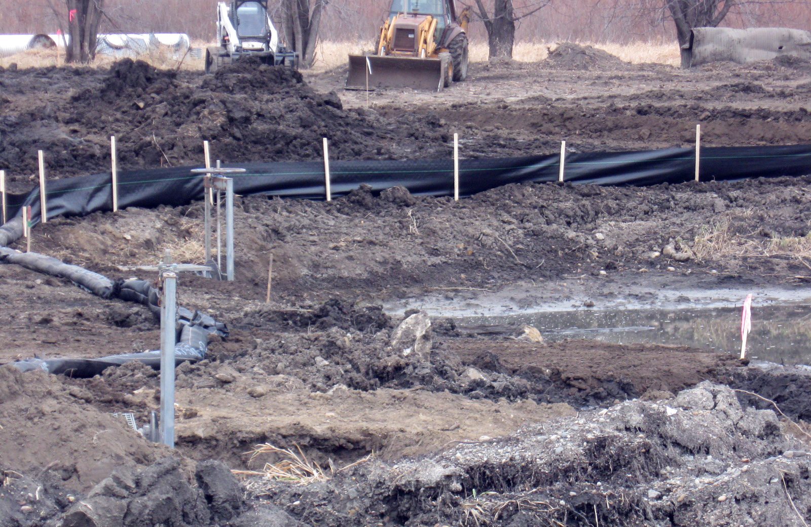 Silt fence installed on an active construction site